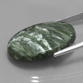 Serafinita verde natural 17,29ct, corte oval, opaco