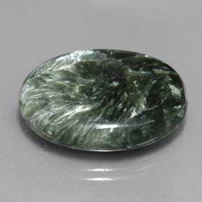 Serafinita verde natural 21,95ct, corte oval, opaco