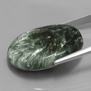 Serafinita verde natural 21,95ct, corte oval, opaco