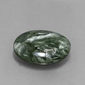 Serafinita verde natural 6,39ct, corte oval, opaco