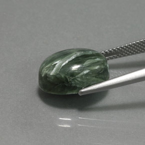 Serafinita verde natural 6,90ct, corte oval, opaco