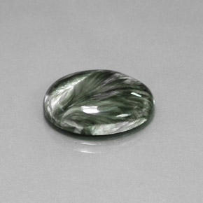 Serafinita verde natural 9,42ct, corte oval, opaco