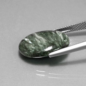 Serafinita verde natural 11,21ct, corte oval, opaco