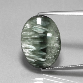 Serafinita verde natural 12,26ct, corte oval, opaco