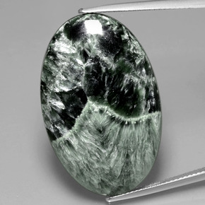 Serafinita verde natural 28,27ct, corte oval, opaco