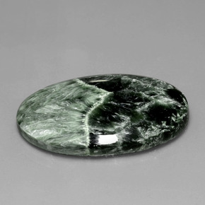 Serafinita verde natural 28,27ct, corte oval, opaco