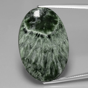 Serafinita verde natural 28,17ct, corte oval, opaco