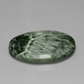 Serafinita verde natural 28,17ct, corte oval, opaco