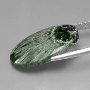 Serafinita verde natural 28,17ct, corte oval, opaco