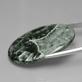 Serafinita verde natural 45,44ct, corte oval, opaco