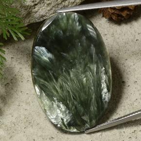 Serafinita verde natural 33,43ct, corte oval, opaco
