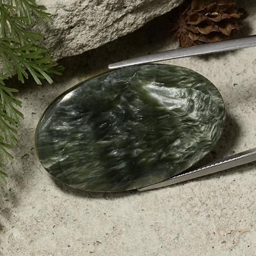 Serafinita verde natural 39,09ct, corte oval, opaco