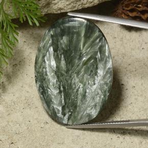 Serafinita verde natural 29,53ct, corte oval, opaco