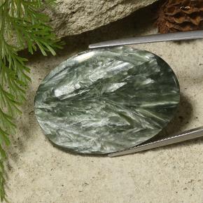 Serafinita verde natural 29,53ct, corte oval, opaco
