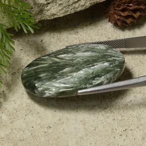 Serafinita verde natural 29,53ct, corte oval, opaco