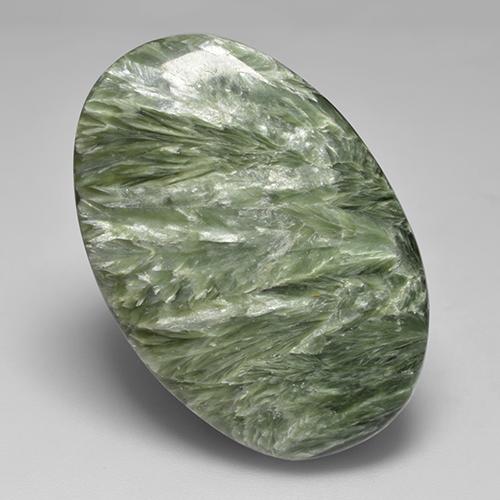 Serafinita verde natural 32,94ct, corte oval, opaco