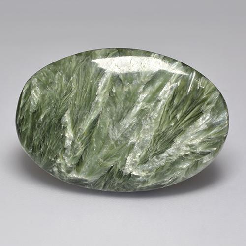Serafinita verde natural 32,94ct, corte oval, opaco