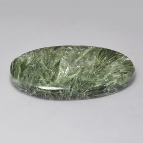 Serafinita verde natural 32,94ct, corte oval, opaco