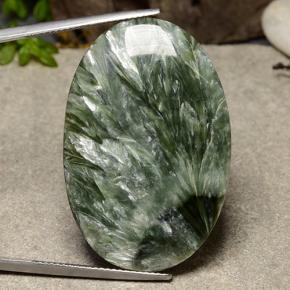 Serafinita verde natural 38,12ct, corte oval, opaco