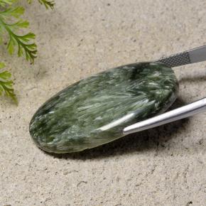 Serafinita verde natural 40,84ct, corte oval, opaco