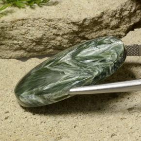 Serafinita verde natural 32,78ct, corte oval, opaco