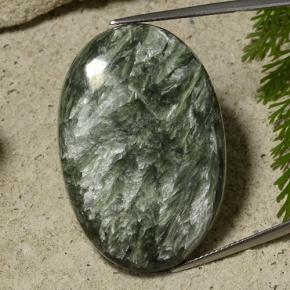 Serafinita verde natural 55,28ct, corte oval, opaco