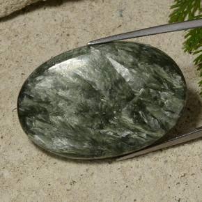 Serafinita verde natural 55,28ct, corte oval, opaco