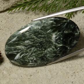 Serafinita verde natural 50,74ct, corte oval, opaco