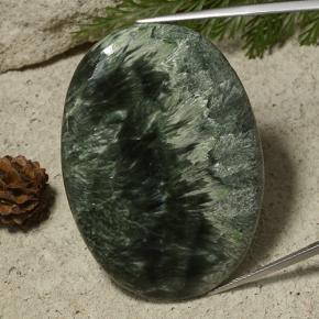 Serafinita verde natural 78,68ct, corte oval, opaco