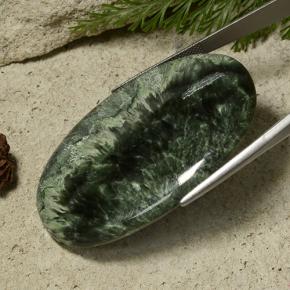 Serafinita verde natural 78,68ct, corte oval, opaco