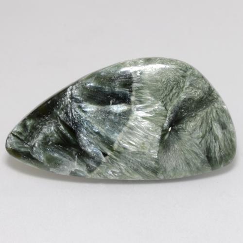 Serafinita verde natural 13,83ct, forma extravagante, opaco