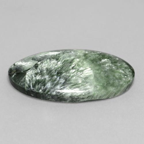 Serafinita verde natural 11,26ct, corte oval, opaco