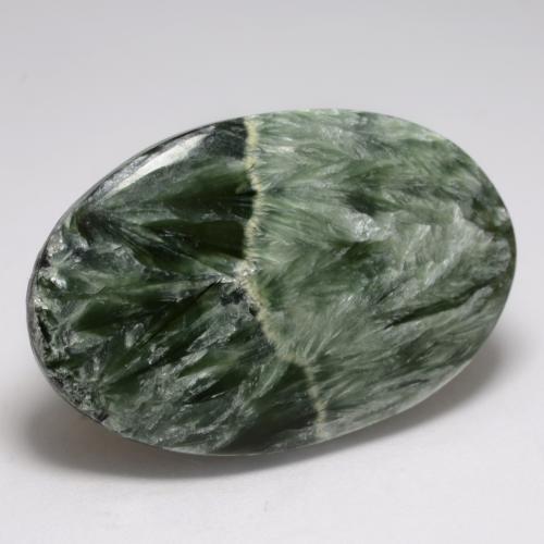 Serafinita verde natural 21,21ct, corte oval, opaco