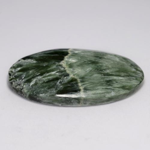 Serafinita verde natural 21,21ct, corte oval, opaco