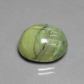 Serpentina verde natural 8,56ct, corte oval, opaco