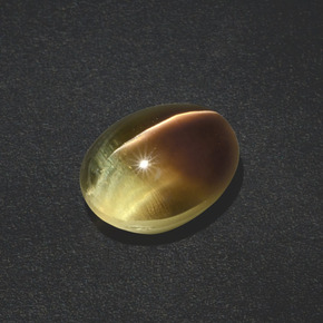 Sillimanite cat's eye marrom natural 3,02ct, corte oval, translúcido