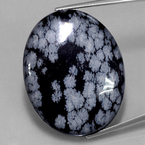 Obsidiana floco de neve preto natural 48,46ct, corte oval, opaco
