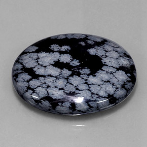 Obsidiana floco de neve preto natural 48,46ct, corte oval, opaco