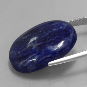 Sodalita azul violeta natural 41,08ct, corte oval, opaco