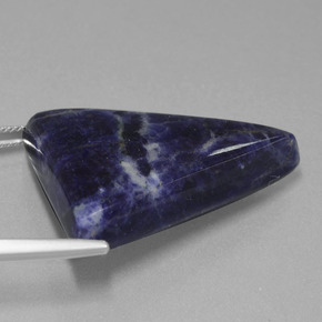 Sodalita azul natural 36,42ct, trillion, opaco