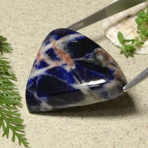 Sodalita azul natural 48,92ct, trillion, opaco