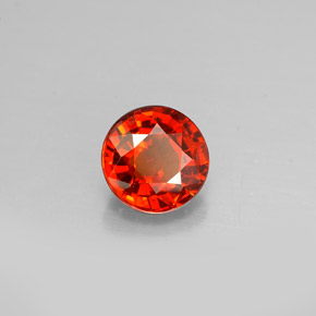 Granada espessartita Tangerina Natural 0.91ct, Corte Redondo, VS