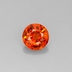 Granada espessartita Tangerina Natural 0.83ct, Corte Redondo, VS