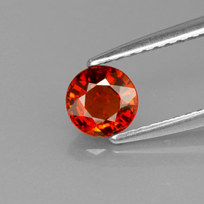 Granada espessartita laranja natural 0,65ct, corte redondo, VVS-VS