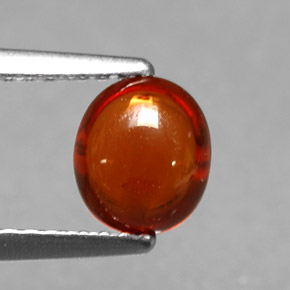 Granada espessartita laranja natural 1,22ct, corte oval, translúcido