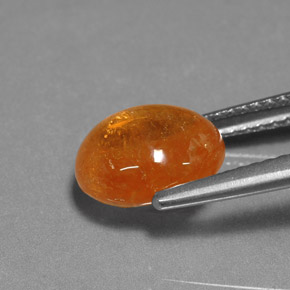 Granada espessartita laranja natural 4,22ct, corte oval, translúcido