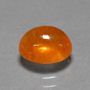 Granada espessartita laranja natural 3,06ct, corte oval, translúcido
