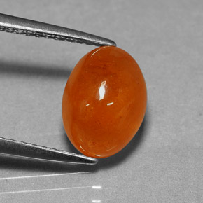 Granada espessartita laranja natural 4,74ct, corte oval, translúcido