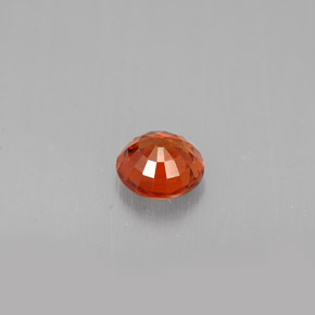 Granada espessartita laranja natural 0,64ct, corte redondo, VS