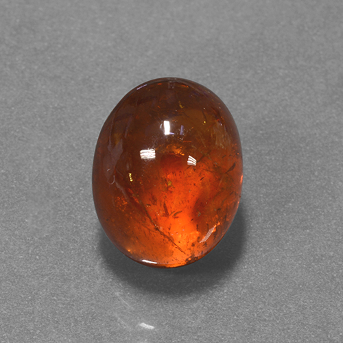 Granada espessartita Laranja escuro Natural 7.05ct, Corte Oval, Translúcido